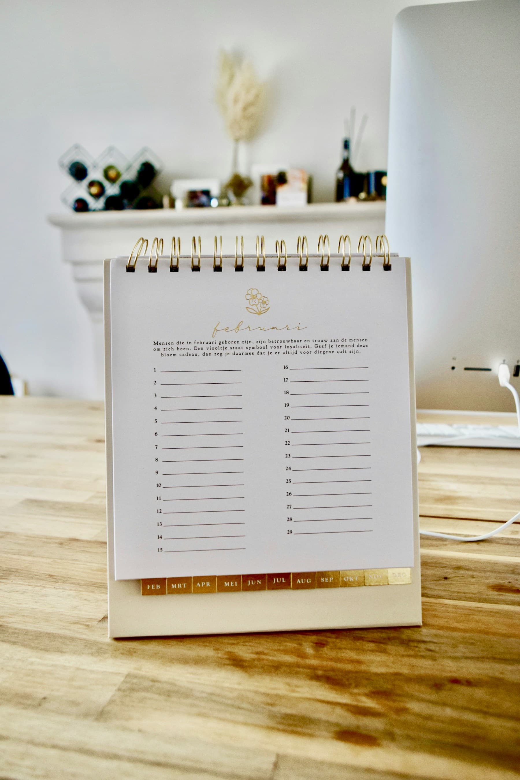 A calendar lying on a wooden table