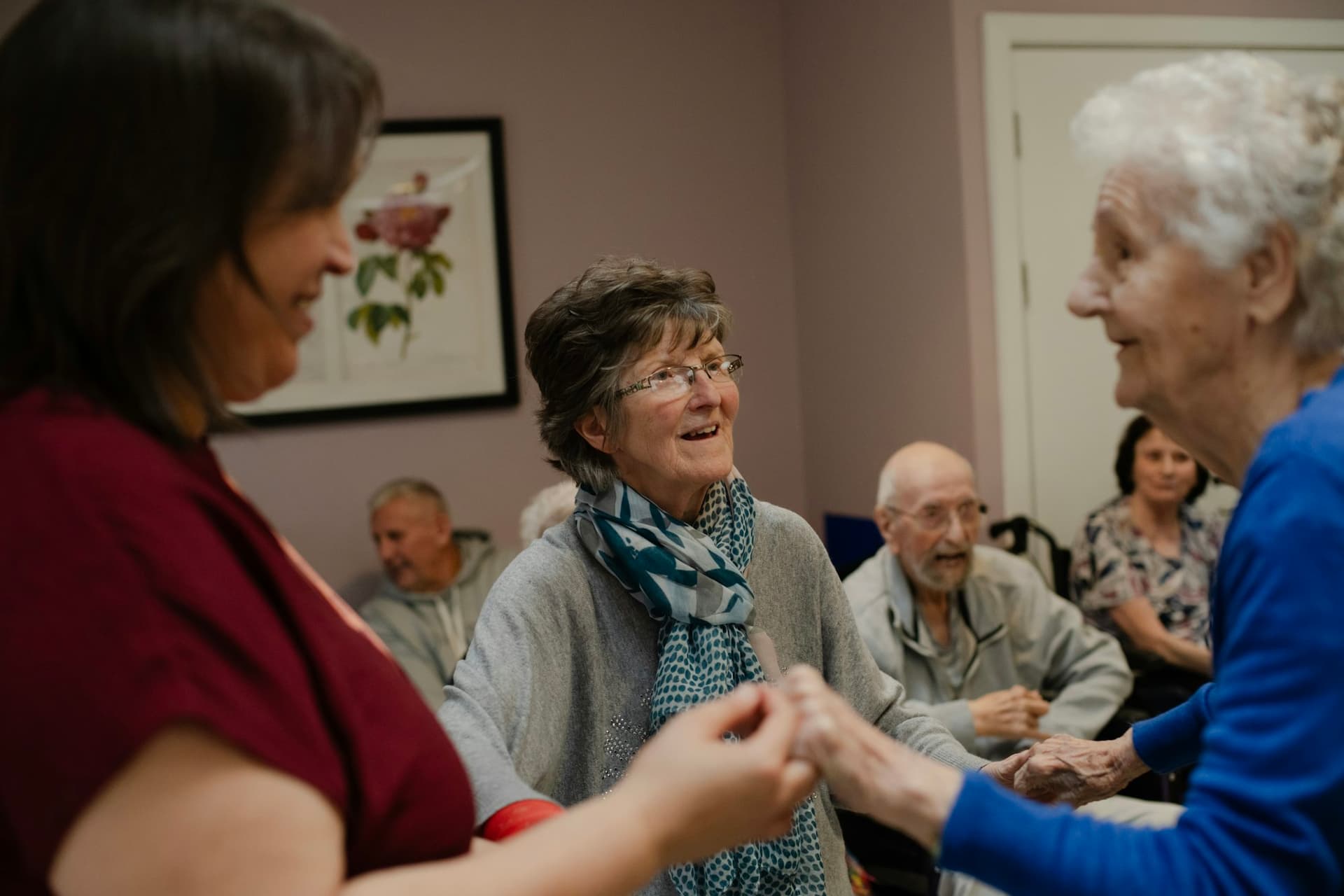 Older people enjoying a lively social gathering indoors